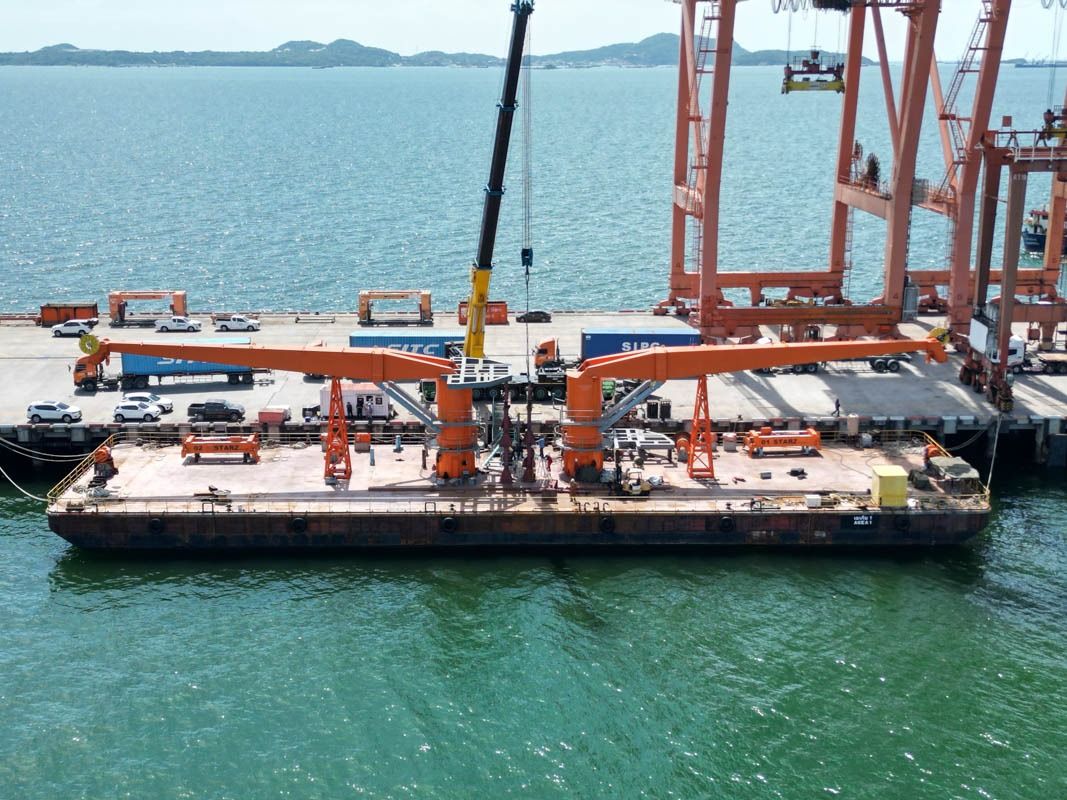 Barge with two cranes for container loading and unloading